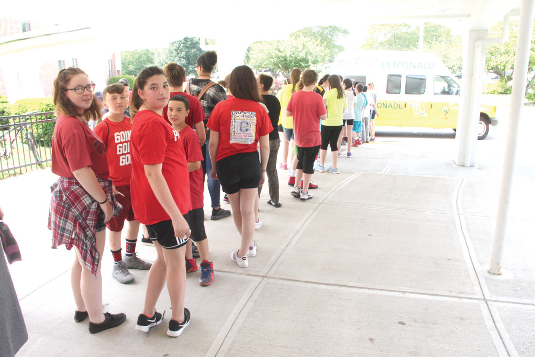 WHAT COULD BE BETTER? Vets students line up for cups of frozen lemonade that was made available by the school PTSA.